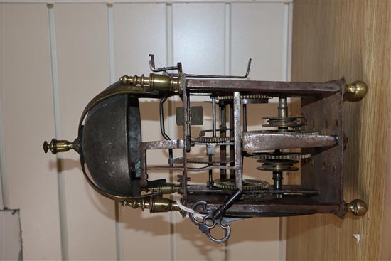 A 17th century lantern clock by Samuel Atkinson with brass Roman chapter ring (faults) height 34cm